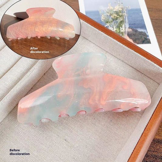 Colour-changing acetate claw hair clip